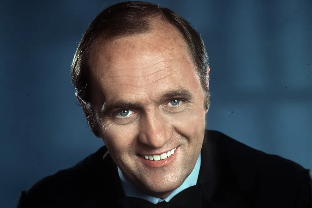 Bob Newhart, legendary comedian known for his deadpan humor, smiling warmly in a classic portrait.