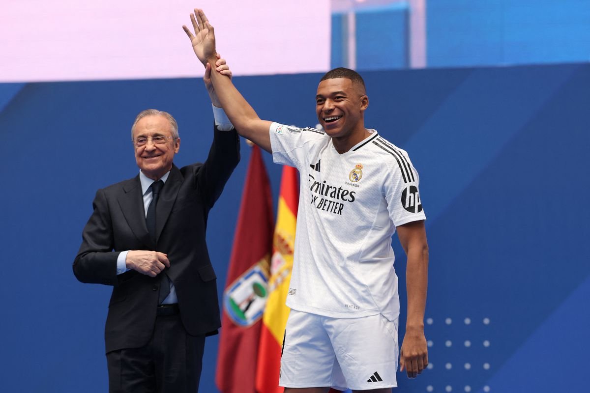 Kylian Mbappe at Real Madrid presentation recreating Cristiano Ronaldo's iconic moment.