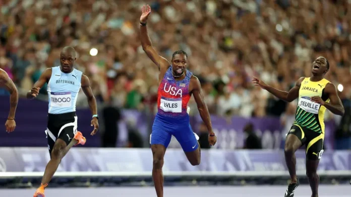 Noah Lyles winning 100m gold at the 2024 Paris Olympics.